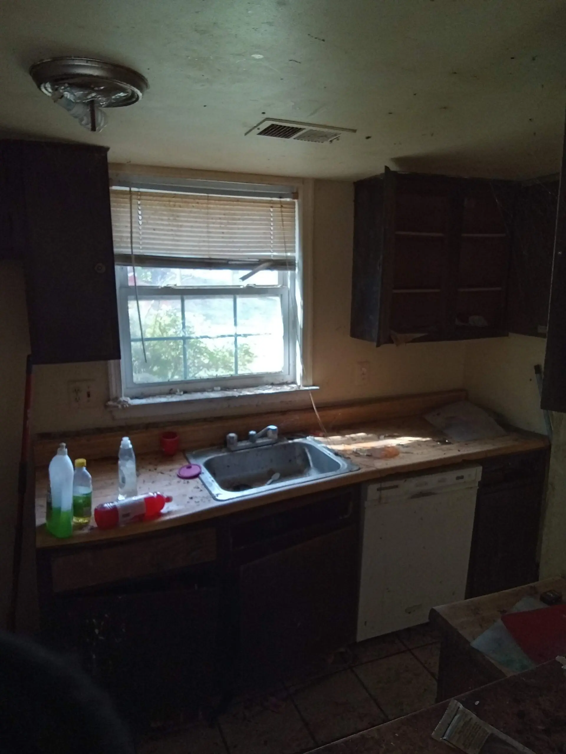 Before Kitchen is restored by Impressions